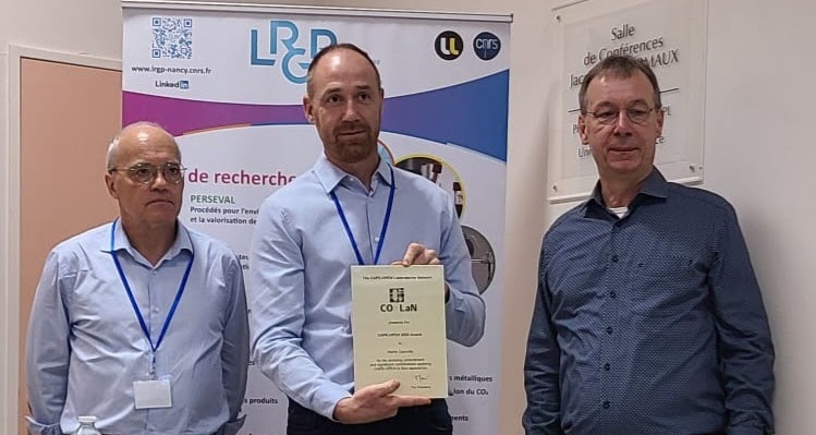 The CAPE-OPEN 2022 Award is presented to Martin GAINVILLE (center) by Dr Richard BAUR (right) and Dr Philippe ARPENTINIER (left)